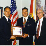 Rep. Carlos Valdes receives Certificate of Appreciation from the Miami-Dade Police Dept. Presented by:
Carlos Alvarez (left) and George Aylesworth (right)