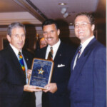 Rep. Carlos Valdes receives the 1997 Florida Sheriffs Legislator of the Year Award from Sheriff Monge, President Florida Sheriffs Association and Maury Kolchakien, Executive Director.