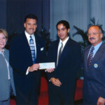 Rep. Carlos Valdes, presents a $1,000.00 scholarship check to Dr. Eduardo Padron, President of Miami- Dade Community College. The money will be used to assist a business student. From left to right: Sandra Gonzalez-Levy, President, M-DCC
Foundation, Rep. Carlos Valdes, Davien Fernandez Jones, Student Government President, & Dr. Eduardo Padron, President Miami Dade Community College.