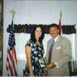 Rep. Carlos Valdes receives Legislative Award from Ms. Melissa Tapanes, President
Florida International University Student Government Council.